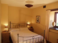 Bedroom in the HorseBarn Holiday Cottage 